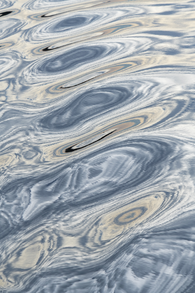 Texture, Flow, Reflection. Boat wake