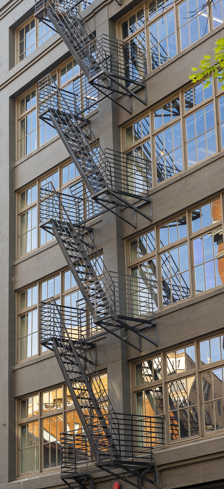 The fire escape stairs mounted to the outside of the Western Building in Downtown Seattle, Washington