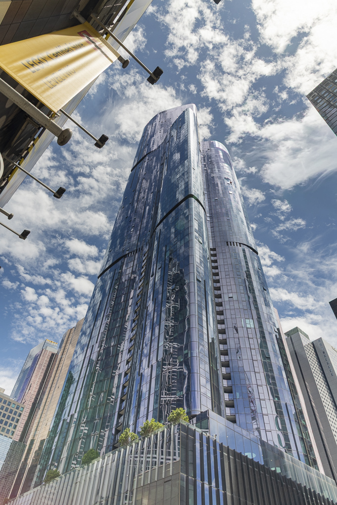 Reflections off a glass covered skyscrapper.  Melbourne, Australia