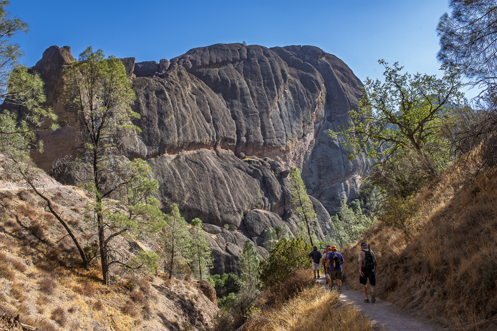 Rocl bluff and hikers at Pinnacles National Park, California
