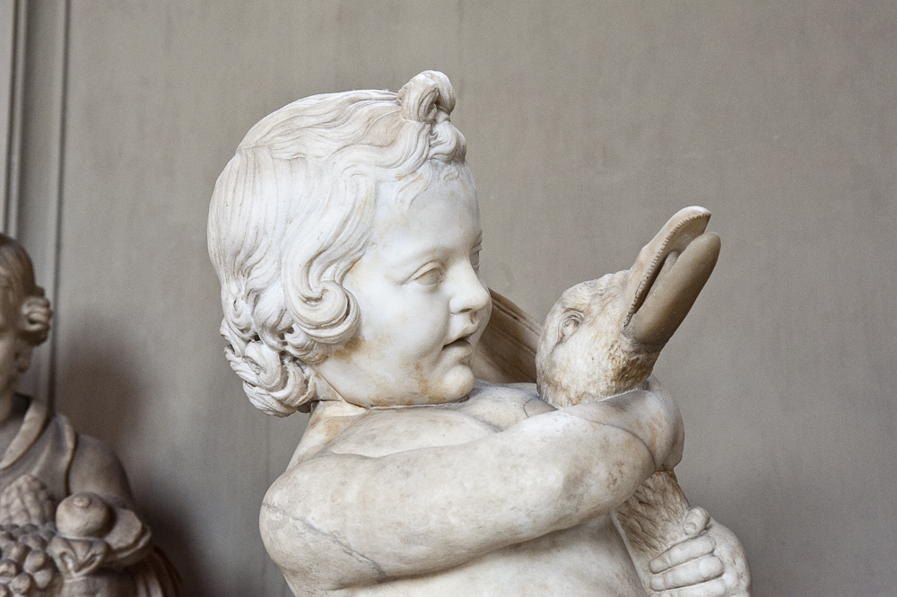 A marble statue of "Boy with Goose" in the Vatican Museum, Vatican City