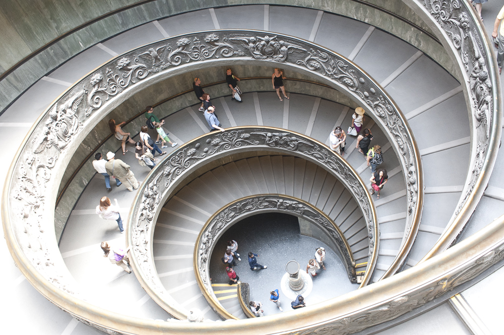 The Double Helix Spiral staircase in the Vatican Museum, Vatican City.  It was designed by Giuseppe Momo in 1932 inspired by the Donato Bramante Staircase designed in 1512.