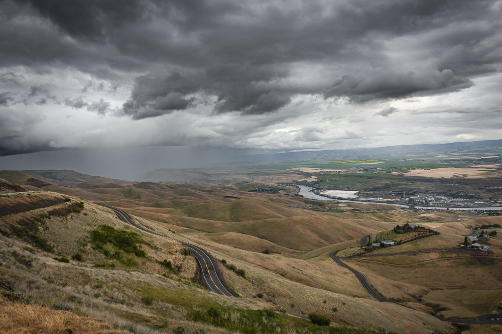 Threatening rainy weather overlooking the Clearwater River and Lewiston, Idaho from the Lewiston HIll Overlook at the top of the Old Spiral Hiway.