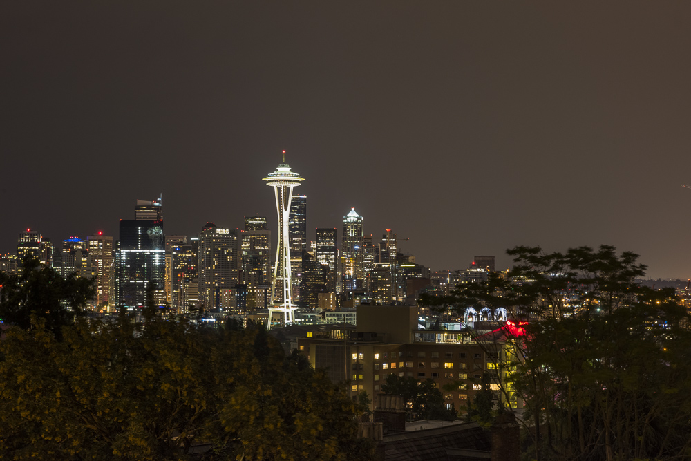 A night shot of the Seattle Skyline from Queen Anne Hill with the iconic Space Needle