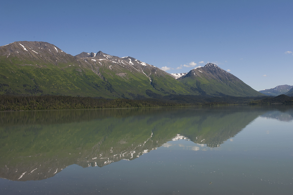 A calm day with reflections on Trail Lake, Alaska